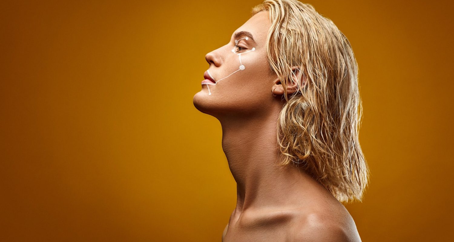 topless woman with blonde hair